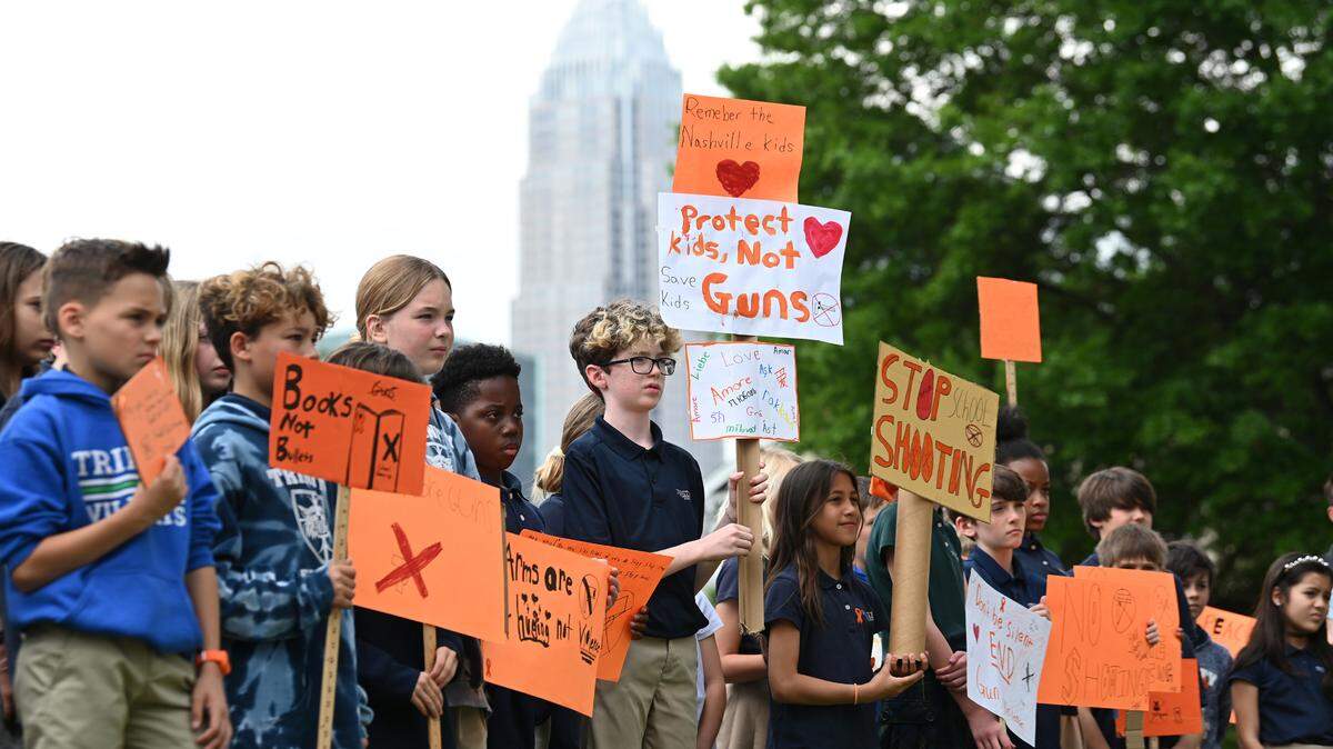 Students in the fifth through eighth grades at Trinity Episcopal School in Charlotte held a walk out on April 5, 2023 as part of a national call for action on gun safety.