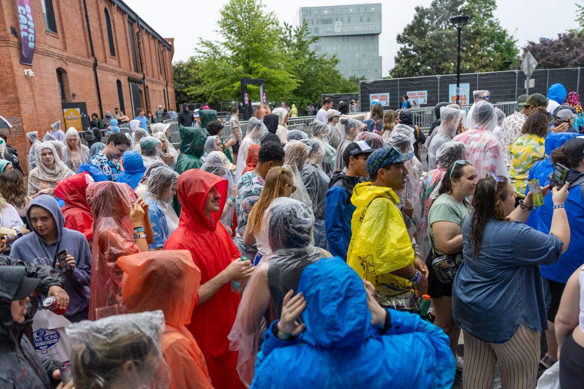 Fans awaiting re-entry after a storm at Lovin’ Life Music Fest.