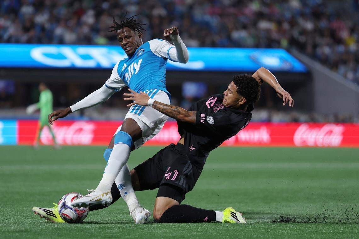 Charlotte FC’s Wilfried Zaha (10) is challenged by Inter Miami CF’s David Ruiz during Saturday’s match at Bank of America Stadium in Charlotte.