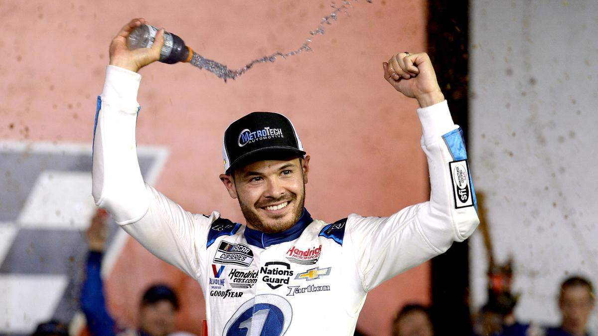 NASCAR driver Kyle Larson celebrates winning the Coca-Cola 600 in Victory Lane at Charlotte Motor Speedway in Concord, NC on Sunday, May 30, 2021.