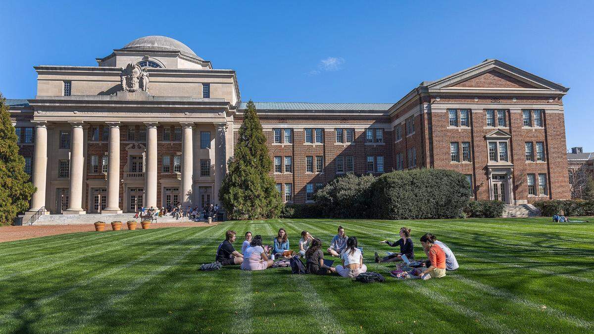 Students outside on the main campus of Davidson College in Davidson, NC.