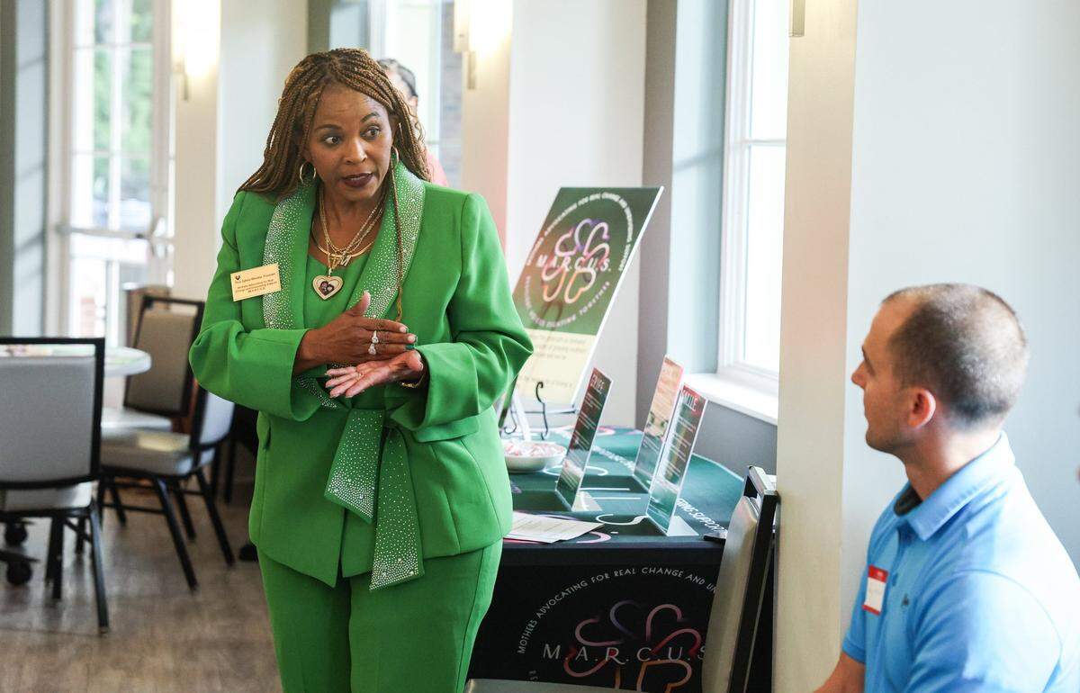 Tina Sykes-Mosley asks a detective a question about pulling information from the cell phone of a defendant during the meeting for the group MARCUS at Indian Trail Town Hall on May 15.