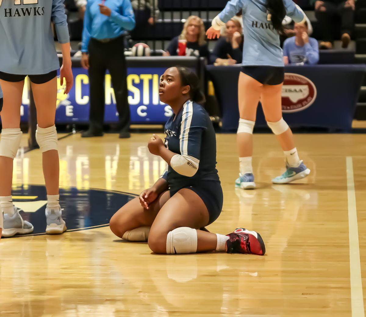A Charlotte Latin player pauses after her team loses a point in Saturday’s state final against North Raleigh Christian.