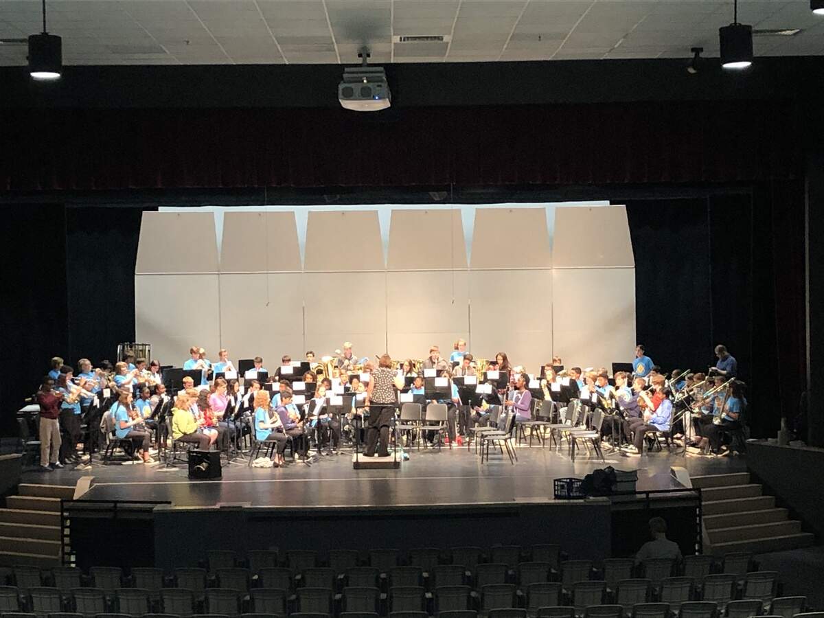 A group of CMS band students rehearses before a CMS Honors Band concert. The non-profit Charlotte Concerts funded CMS honors music programs for more than two decades. But Charlotte Concerts has folded, so CMS is looking for new donors.