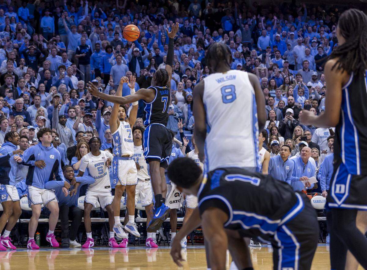 North Carolina guard Seth Trimble (7) launches a three-point shot with .4 seconds to play against Duke to win the game 71-68 on Saturday, February 7, 2026 at the Smith Center in Chapel Hill, N.C.