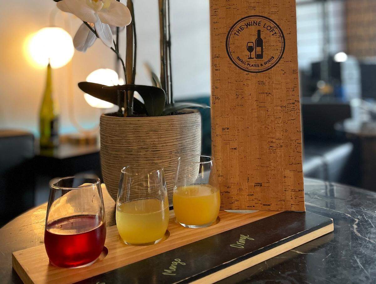Order a wine flight at The Wine Loft, now serving Sunday brunch.