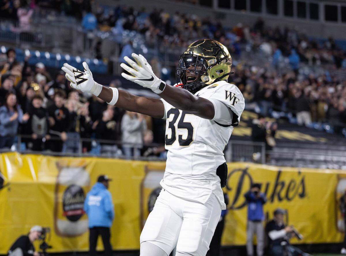 Wake Forest's Kordell Bartley (35) celebrates his kickoff return for a touchdown during first-quarter action. Wake Forest played Mississippi State in the Duke's Mayo Bowl at Bank of America Stadium on Friday, Jan. 2, 2026.