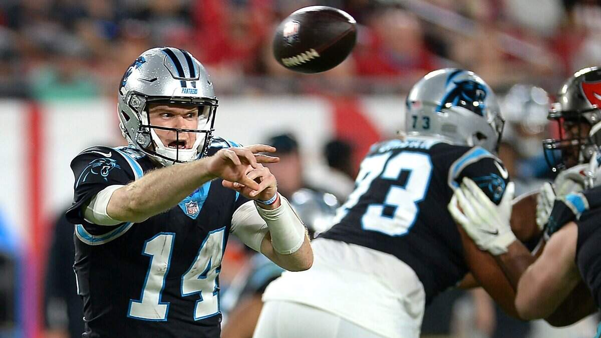 Carolina Panthers quarterback Sam Darnold hurries to get a pass off during the third quarter against the Tampa Bay Buccaneers at Raymond James Stadium in Tampa in January. Darnold is likely to remain the Panthers’ starter next season.