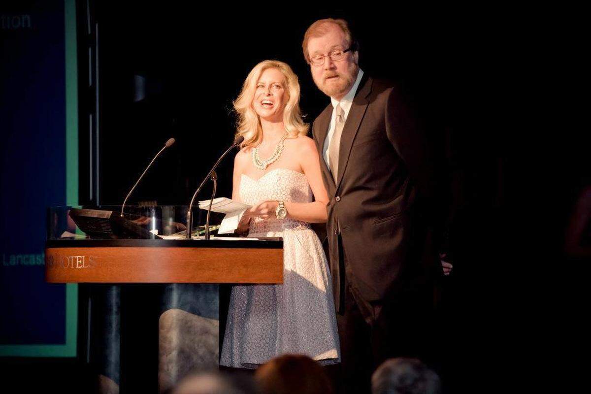 Tom Hollis and actress Allison Lowe at the 2011 Metrolina Theatre Association awards show. In 2019 the group awarded Hollis its Theatre Person of the Year award for his 37 years of work in the drama department at Central Piedmont Community College.