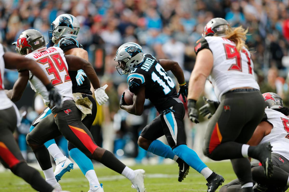 Carolina Panthers’ Curtis Samuel (10) runs for a touchdown against the Tampa Bay Buccaneers in the first half of an NFL football game in Charlotte, N.C., Sunday, Nov. 4, 2018. (AP Photo/Nell Redmond)