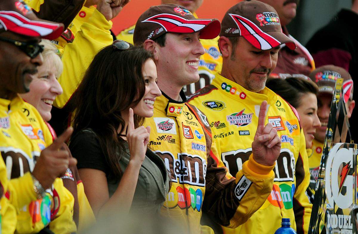 2/12/09 NASCAR driver Kyle Busch celebrates his victory in the second Gatorade Duel race at Daytona International Speedway Thursday. Kyle Busch will start in the fourth position for the Daytona 500 that will be run on Sunday, February 15th. JEFF SINER - jsiner@charlotteobserver.com