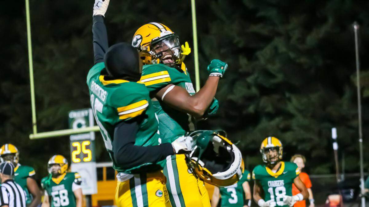 Crest Chargers upset Charlotte Catholic, 27-21 .