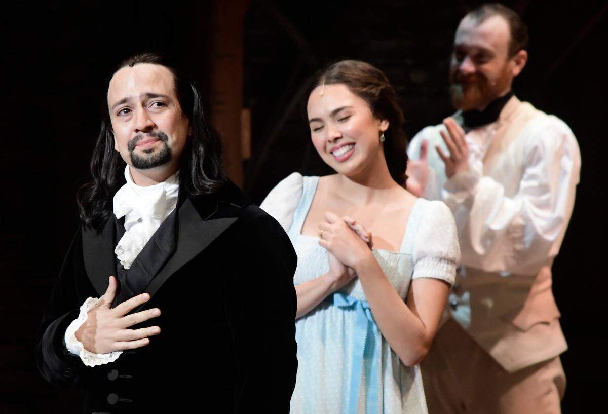 Lin-Manuel Miranda, creator of the award-winning Broadway musical, Hamilton, receives a standing ovation with tears at the ending of the play’s premiere held at the Santurce Fine Arts Center, in San Juan, Puerto Rico, Friday, Jan. 11, 2019. The musical is set to return to Charlotte in 2021. (AP Photo/Carlos Giusti)