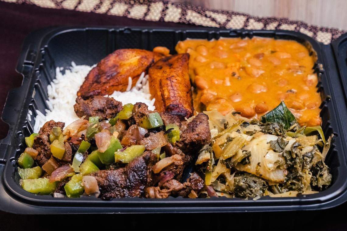 Serengeti Kitchen’s Grilled Lamb Bites Swahili Plate comes with coconut rice, marinated lamb with fresh bell pepper and onion, collards and cabbage, coconut pinto beans and sweet fried plantains.