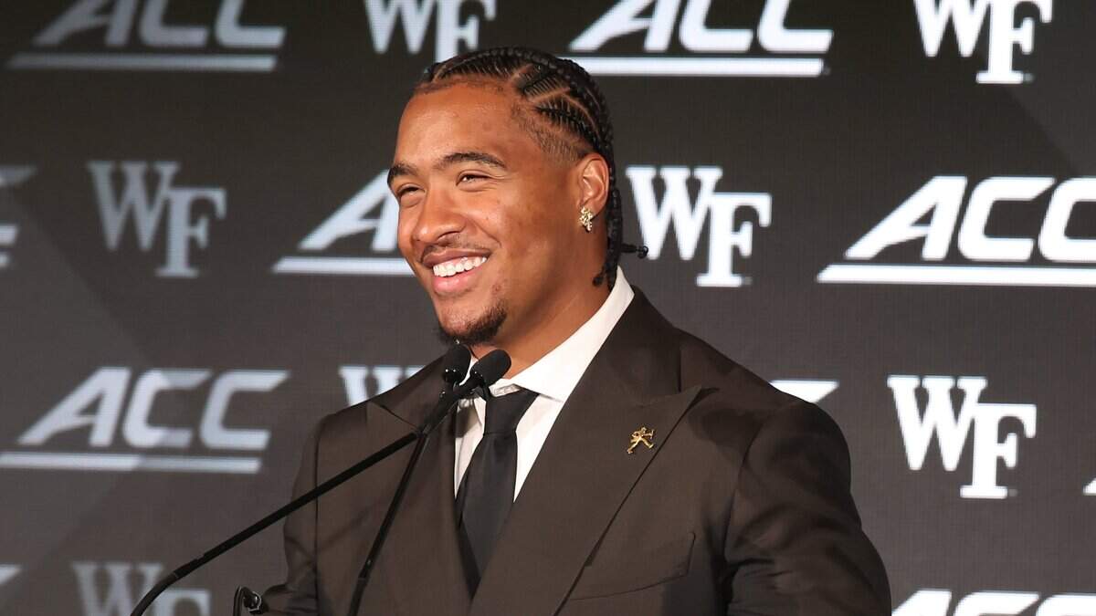Wake Forest quarterback Gio Lopez smiles as he responds to a question during the 2026 ACC Football Kickoff program at the Charlotte Hilton Uptown hotel in Charlotte, NC on Friday, July 17, 2026.