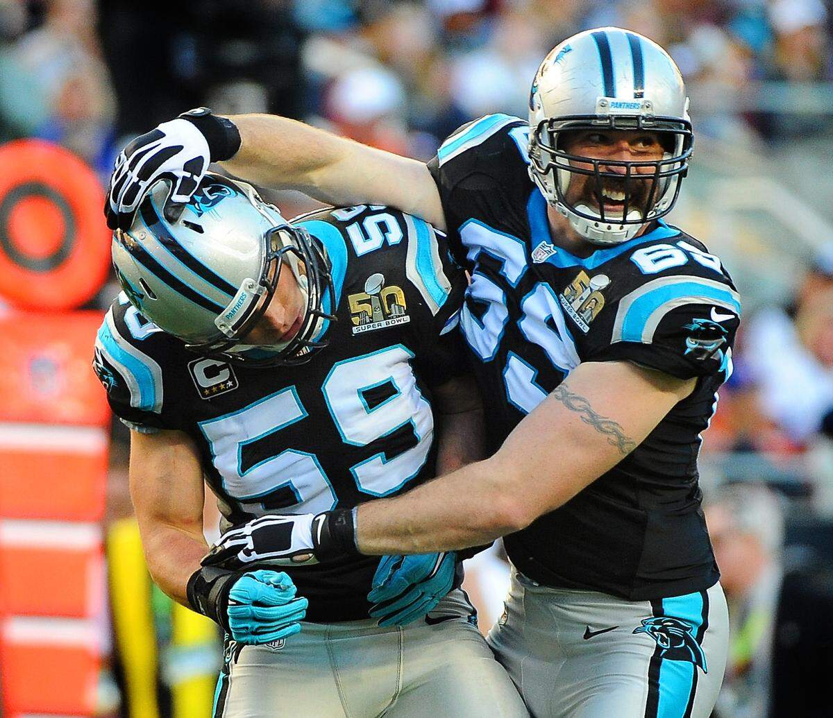 Jared Allen (right) congratulates Carolina Panthers linebacker Luke Kuechly during Super Bowl 50. Allen played 12 years in the NFL, starting for Carolina in 2015 during his only season with the Panthers before retiring.