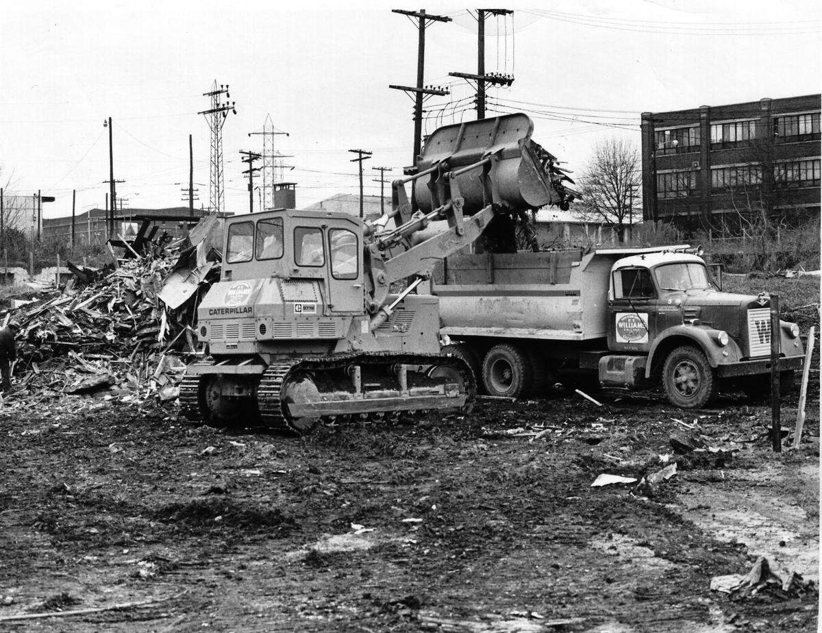 Workers clear some remains of the Brooklyn neighborhood in January 1969.