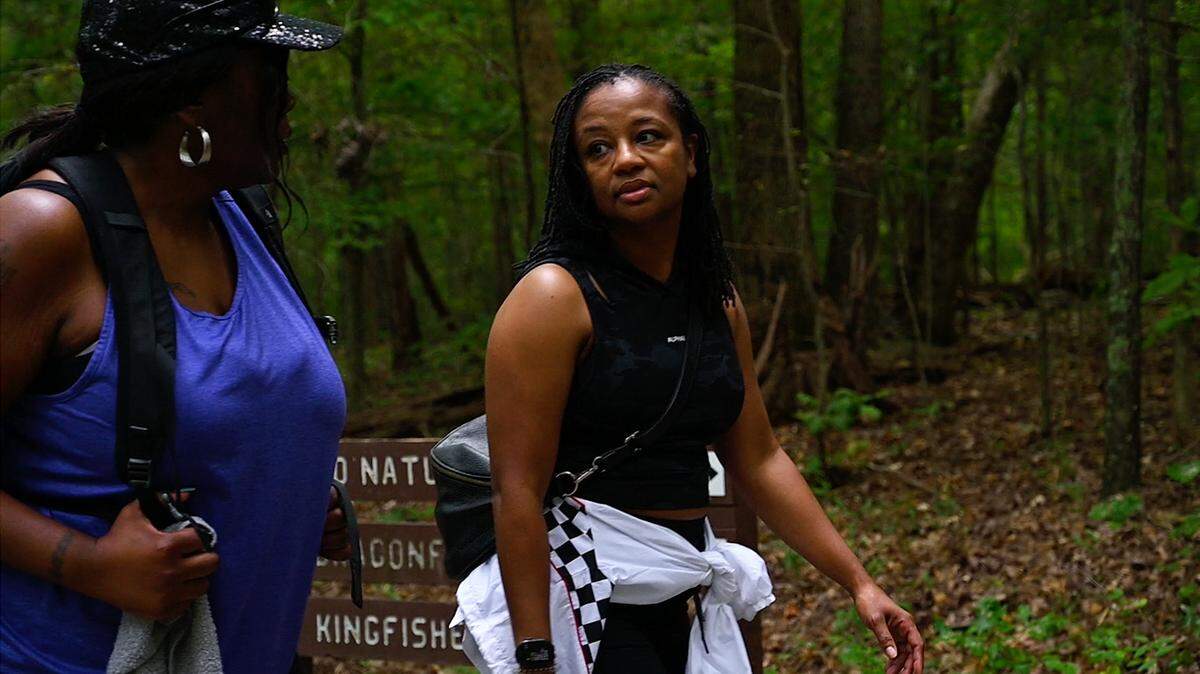 Malika White (left) is the founder of the non-profit “Black Girls Do Hike” and Kendra Cooper (right) joins her at Reedy Creek Park in East Charlotte, N.C.