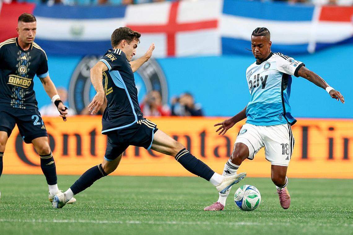CHARLOTTE, NORTH CAROLINA - OCTOBER 18:  Milan Iloski #32 of Philadelphia Union challenges Kerwin Vargas #18 of Charlotte FC for control during the first half of the MLS match between Philadelphia Union and Charlotte FC at Bank of America Stadium on October 18, 2025 in Charlotte, North Carolina. (Photo by Grant Halverson/Getty Images)