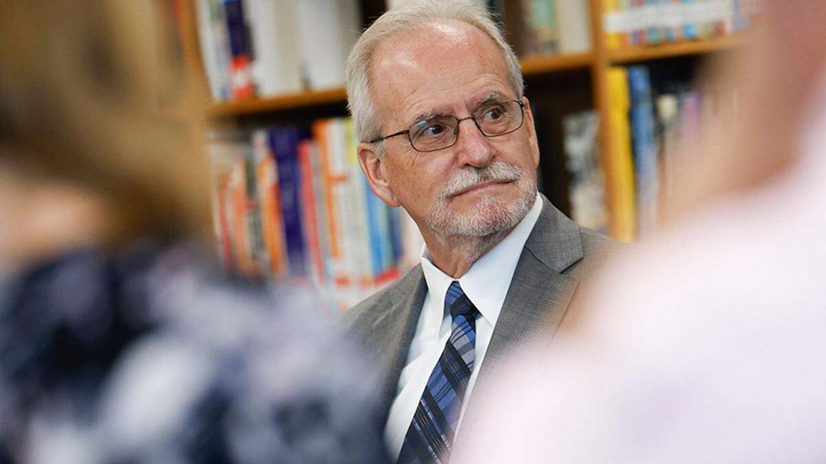 CMS interim superintendent Hugh Hattabaugh steps down Dec. 31, six months before his contract ends.