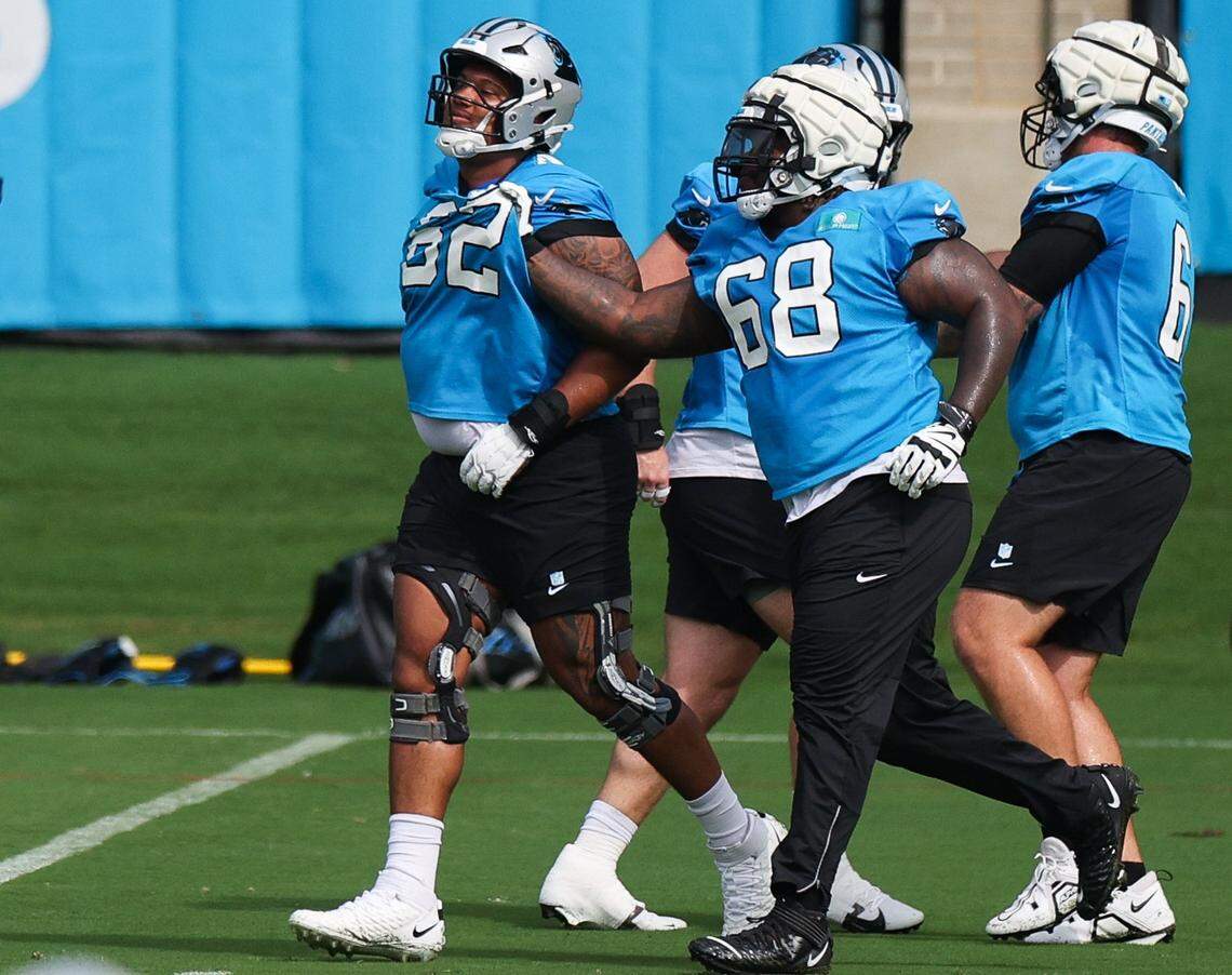 Panthers guard Damien Lewis (68) runs through a drill during training camp practice in Charlotte, NC on Monday, July 29, 2024.