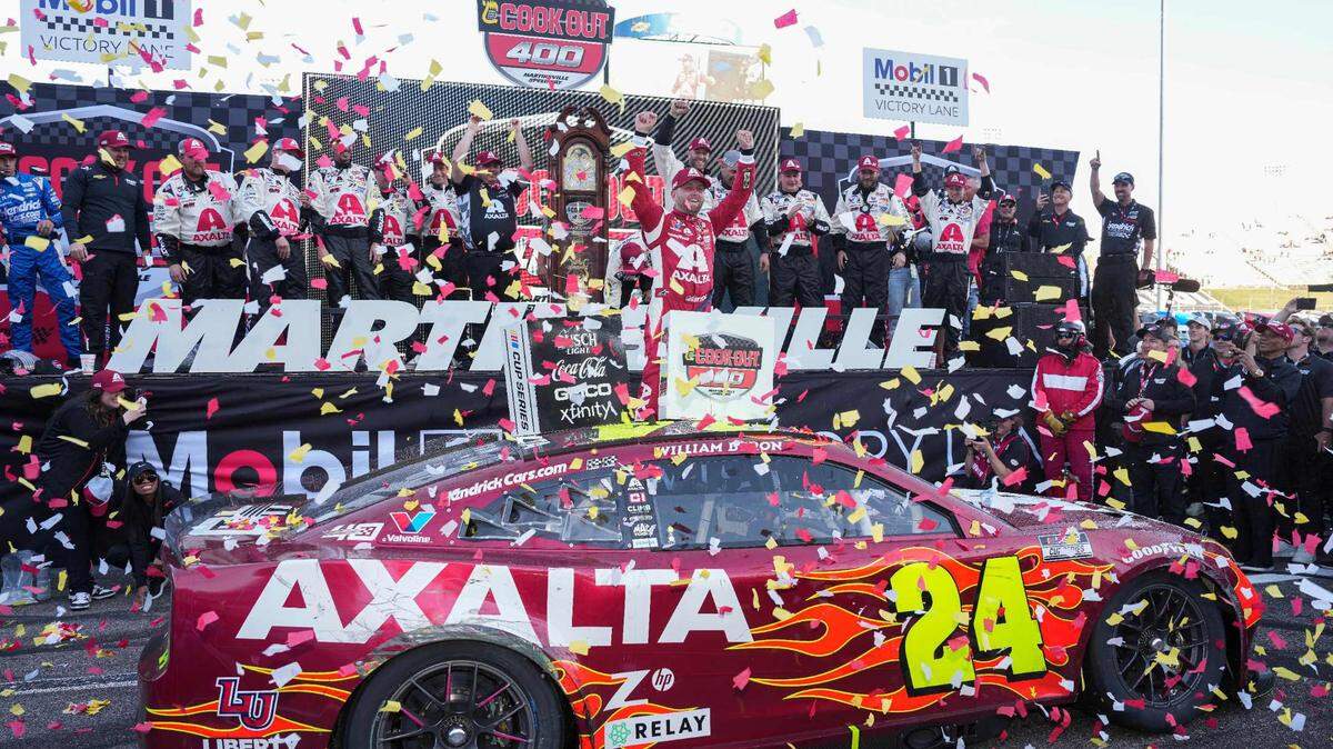 Apr 7, 2024; Martinsville, Virginia, USA; NASCAR Cup Series driver William Byron (24) celebrates his win during the Cook Out 400 at Martinsville Speedway.