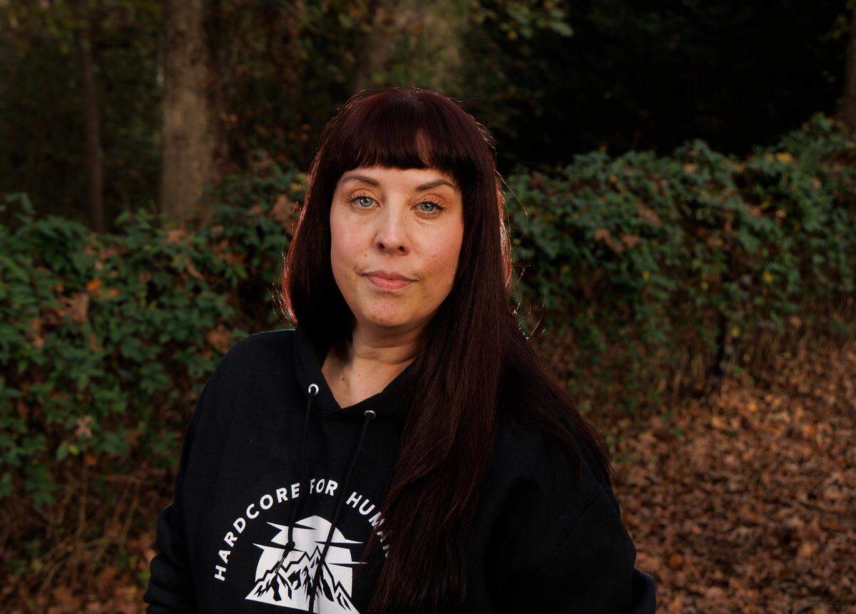 Dana Flaherty, photographed at her home in Willow Spring, says she didn't create the Facebook group so she could be praised for it. But beneficiaries of the program are happy to do so anyway. "It's just such a nice thing," says "adoptee" Casey Bradley, "that Dana has put together such a great outreach for families to not worry about Christmas."