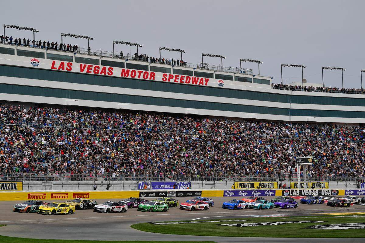 Mar 16, 2025; Las Vegas, Nevada, USA; NASCAR Cup Series driver Michael McDowell (71) and driver Joey Logano (22) lead the field for the start of the Pennzoil 400 at Las Vegas Motor Speedway.