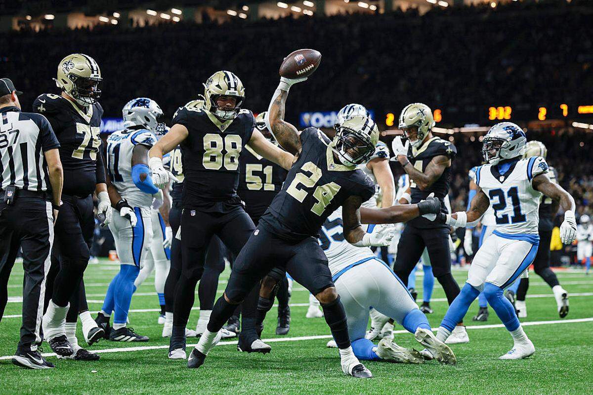 New Orleans Saints running back Devin Neal (24) celebrates after scoring a touchdown during the second quarter of Sunday’s game against the Carolina Panthers at Caesars Superdome.