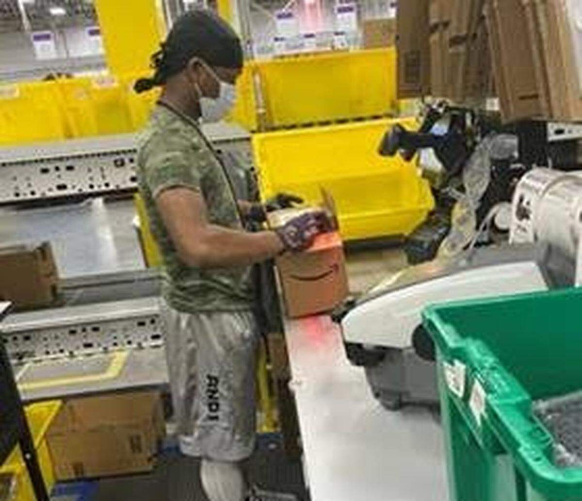 Jakobe Wheeler packs a customer’s order inside Amazon’s West Charlotte Fulfillment Center. Due to increased demand, Amazon has hired more than 3,900 new jobs across North Carolina in the past four weeks, adding to the 3,500 already employed across the state.