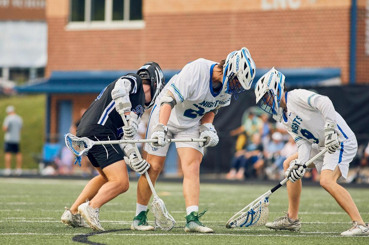 Lake Norman Charter School and Community School of Davidson players search for the ball in a scrum in the NCHSAA Regional Finals. The Knights head to the State Championship for 1A/2A/3A against the Croatan High School Cougars.
