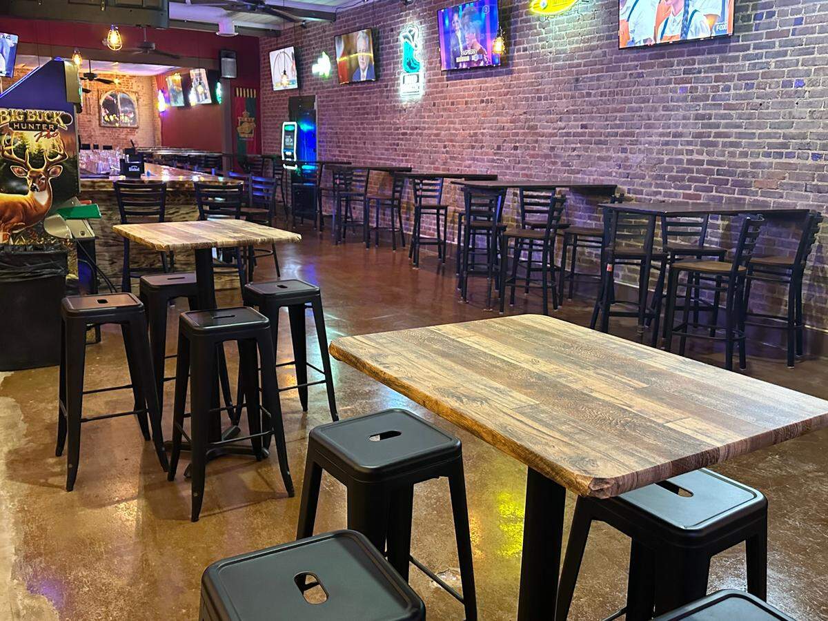 At Two Buck Saloon, TVs hang throughout the space.