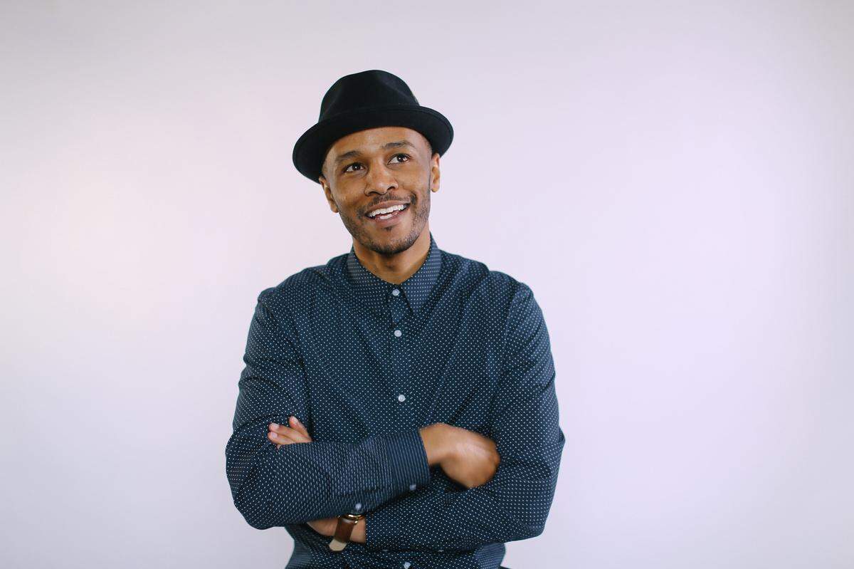 David “Dae-Lee” Arrington, a founding member of the Hue House creative agency, likes to get face-to-face with clients and be “present.”