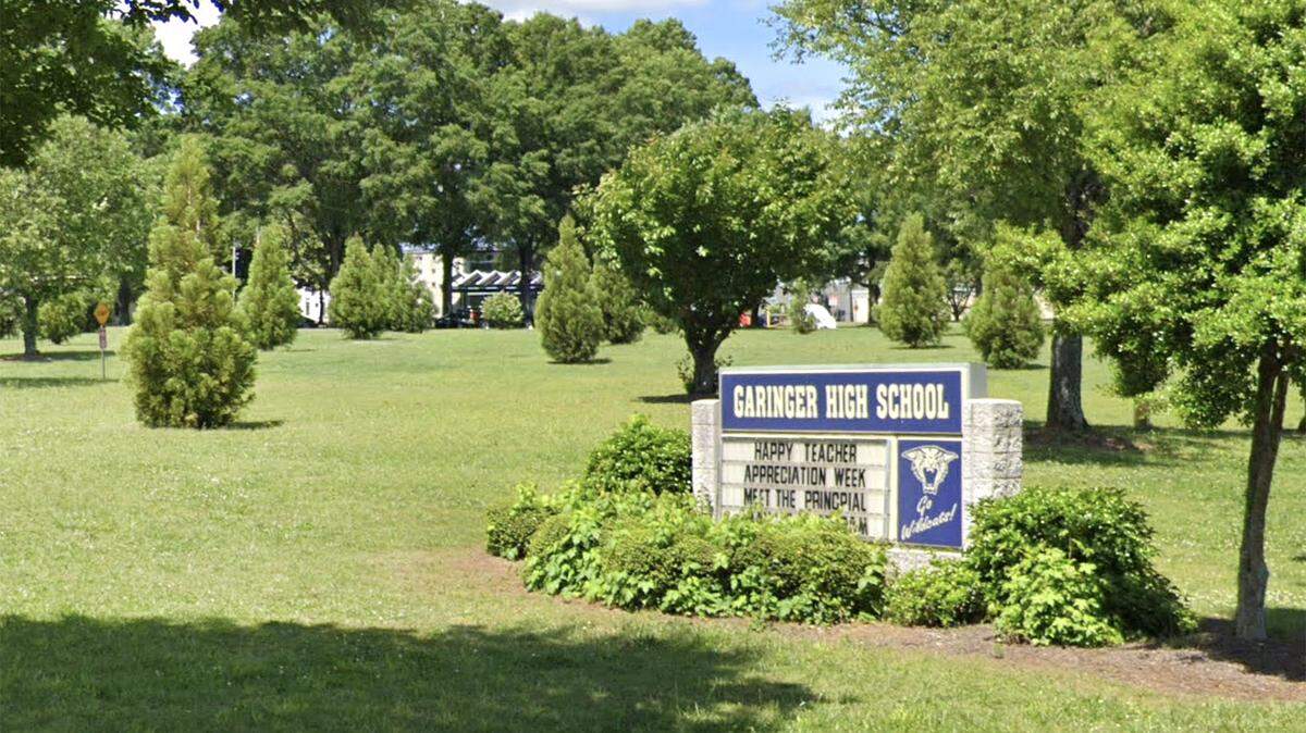 Garinger High School is on lock down following a shooting near campus Tuesday morning. One suspect has been detained in connection to the incident, CMPD said.