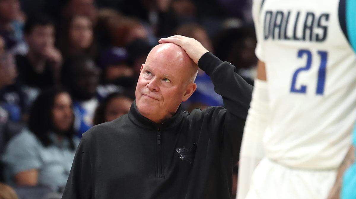 Charlotte Hornets head coach Steve Clifford looks to the scoreboard and rubs his head during second-half action against the Dallas Mavericks on Tuesday, April 9, 2024 at Spectrum Center in Charlotte, NC. The Mavericks defeated the Hornets 130-104 in what was Clifford’s final home game as coach.