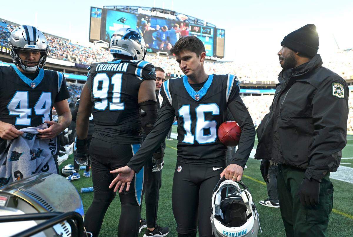 Carolina Panthers kicker Matthew Wright warms up his hands along the sideline before heading into the game for a kick during action against the Tampa Bay Buccaneers at Bank of America Stadium in Charlotte, NC on Sunday, January 7, 2024. Wright missed the field goal. The Buccaneers defeated the Panthers 9-0.
