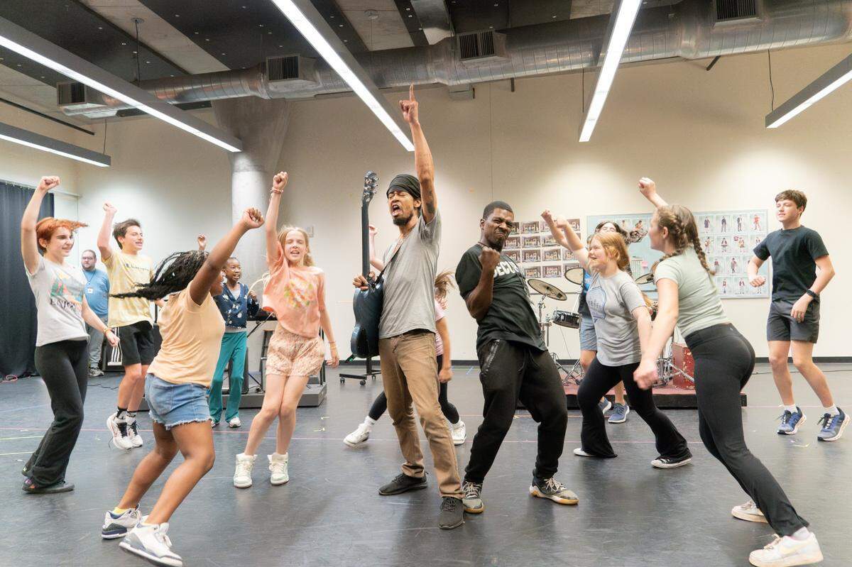 At a Children’s Theatre of Charlotte studio rehearsal for “School of Rock,” Dewey, played by Jeremy DeCarlos, and his students perform the song “Stick It To the Man.”