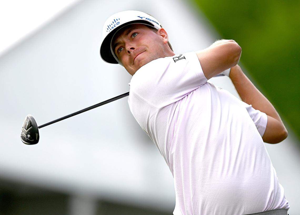 Golfer Keith Mitchell watches his drive from the eighth tee box during third round action of the Wells Fargo Championship at Quail Hollow Club in Charlotte, NC on Saturday, May 8, 2021.