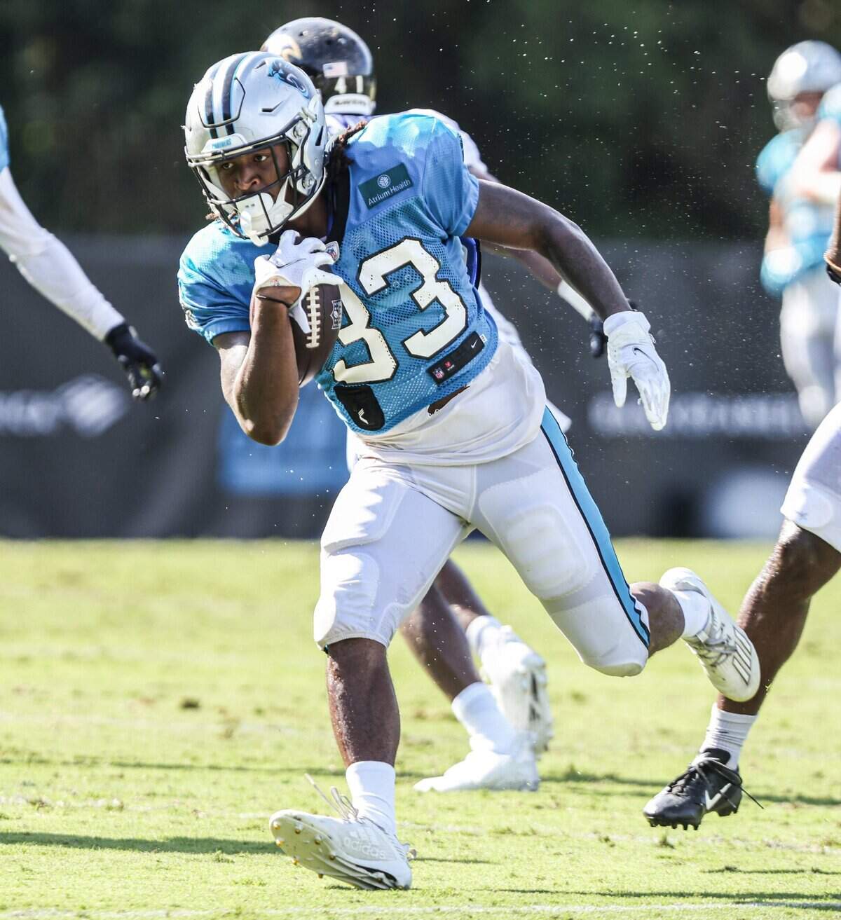 Carolina Panthers Spencer Brown runs the ball during the joint practice with the Baltimore Ravens in Spartanburg, S.C., on Thursday, August 19, 2021.