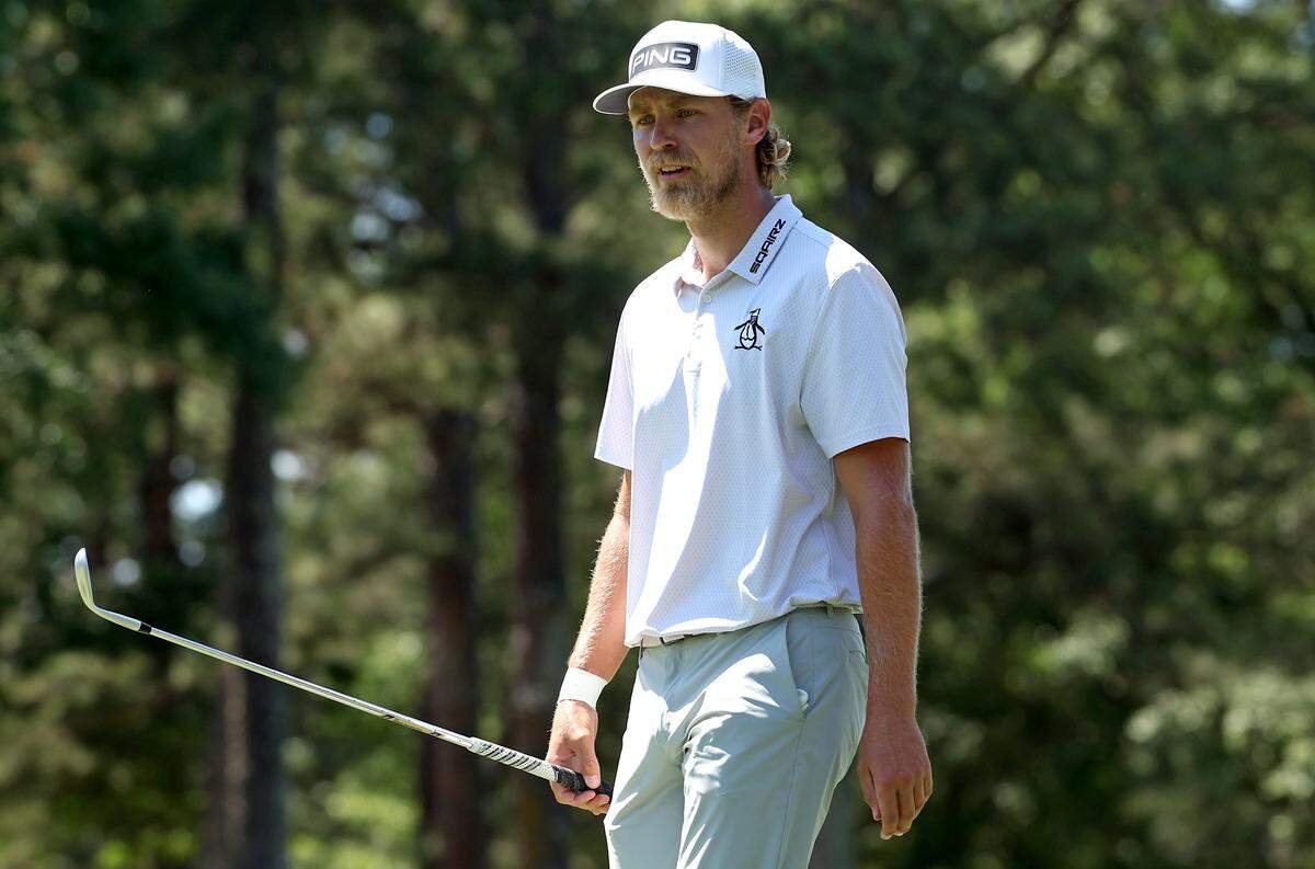 Kristoffer Reitan studies his line to the cup on the fifth green during the final round of the Truist Championship at Quail Hollow Club in Charlotte, NC on Sunday, May 10, 2026.