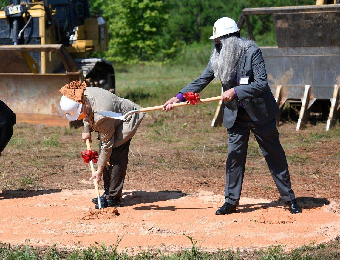 Catawba Indian Nation Chief Bill Harris throws the first shovel of dirt during the groundbreaking ceremony for a new, state-of-the art casino development project in Kings Mountain on Wednesday, July 22, 2020.