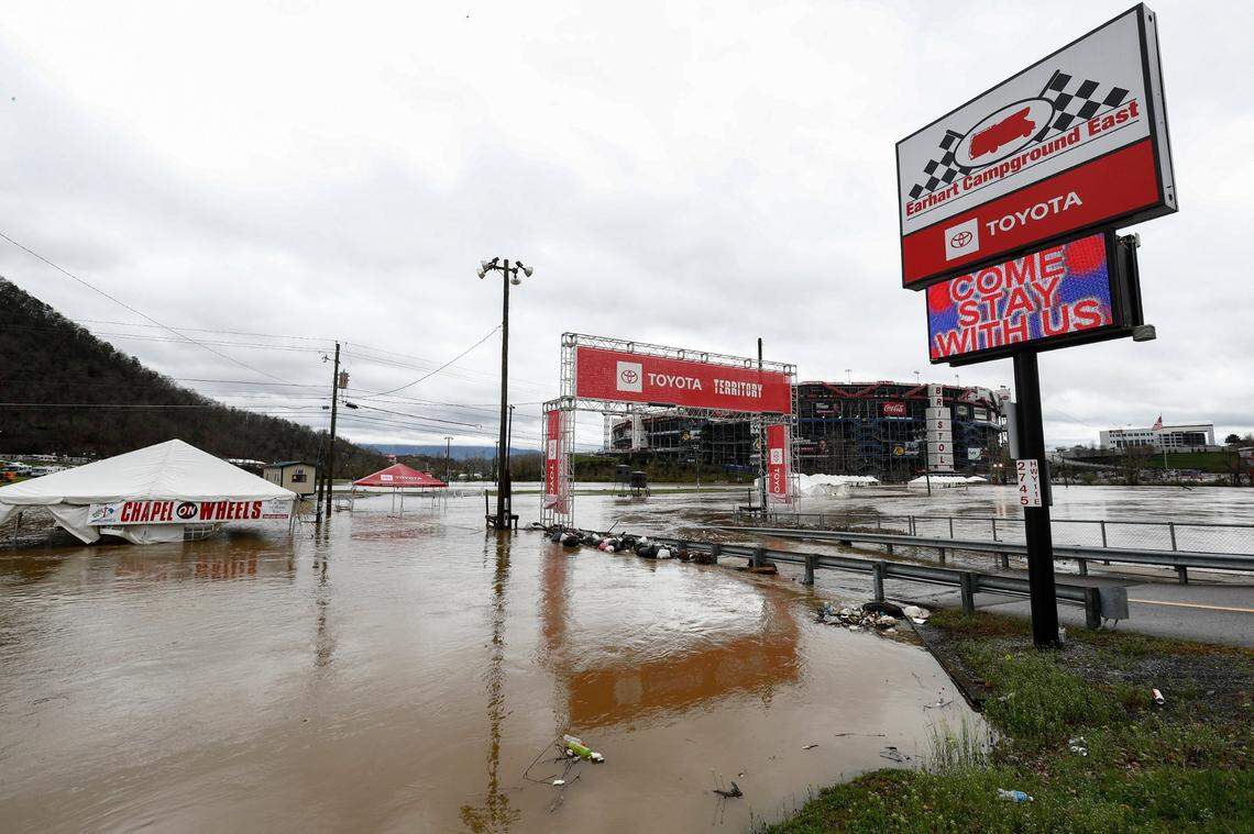 Water floods the vendor area as races for both the Truck Series and NASCAR Cup Series auto race were postponed due to inclement weather at Bristol Motor Speedway, Sunday, March 28, 2021, in Bristol, Tenn. (AP Photo/Wade Payne)