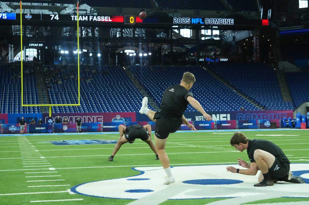Feb 26, 2025; Indianapolis, IN, USA; Arizona place kicker Tyler Loop (PK05) kicks a field goal during workouts at the 2025 NFL Scouting Combine at Lucas Oil Stadium. Mandatory Credit: Kirby Lee-Imagn Images