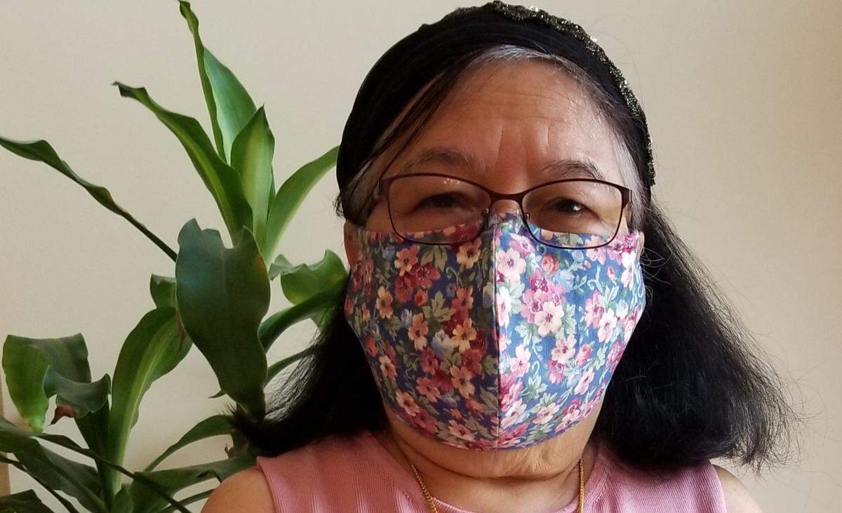 Ann Garrity sews masks in a variety of patterns and solids, which are available from Thairishpepper on Etsy.