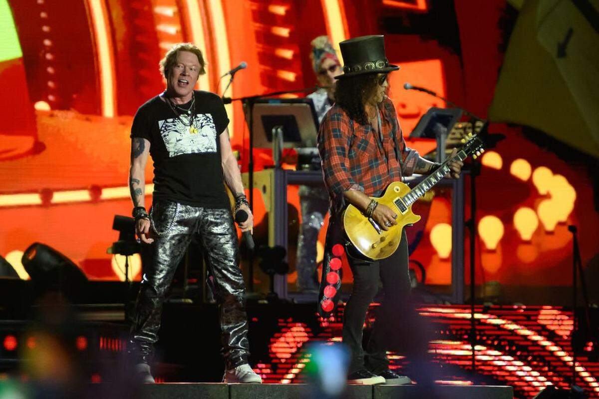 Axl Rose, left, and Slash of Guns N’ Roses perform in Glastonbury, England, on June 24, 2023.