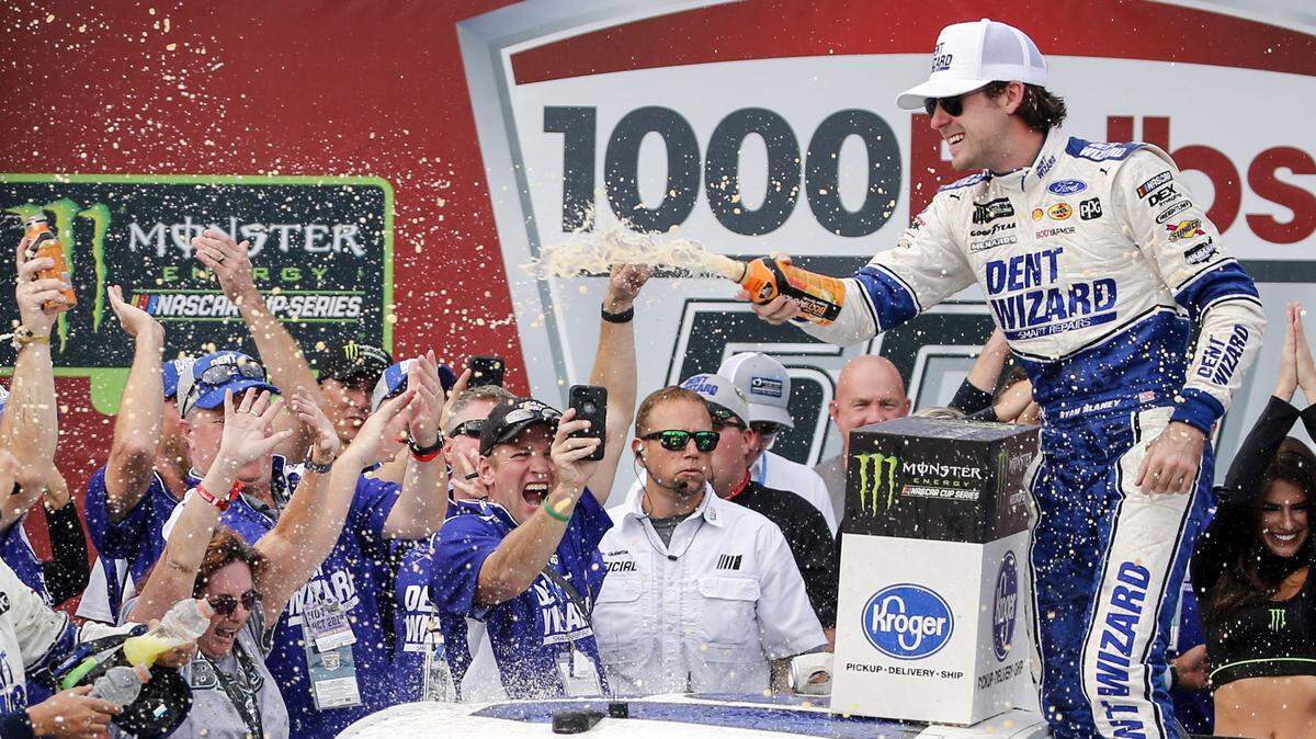 Ryan Blaney (right) celebrates in Victory Lane after winning the NASCAR Cup race at Talladega Superspeedway. The win guarantees Blaney a spot in the next round of the NASCAR Cup playoffs
