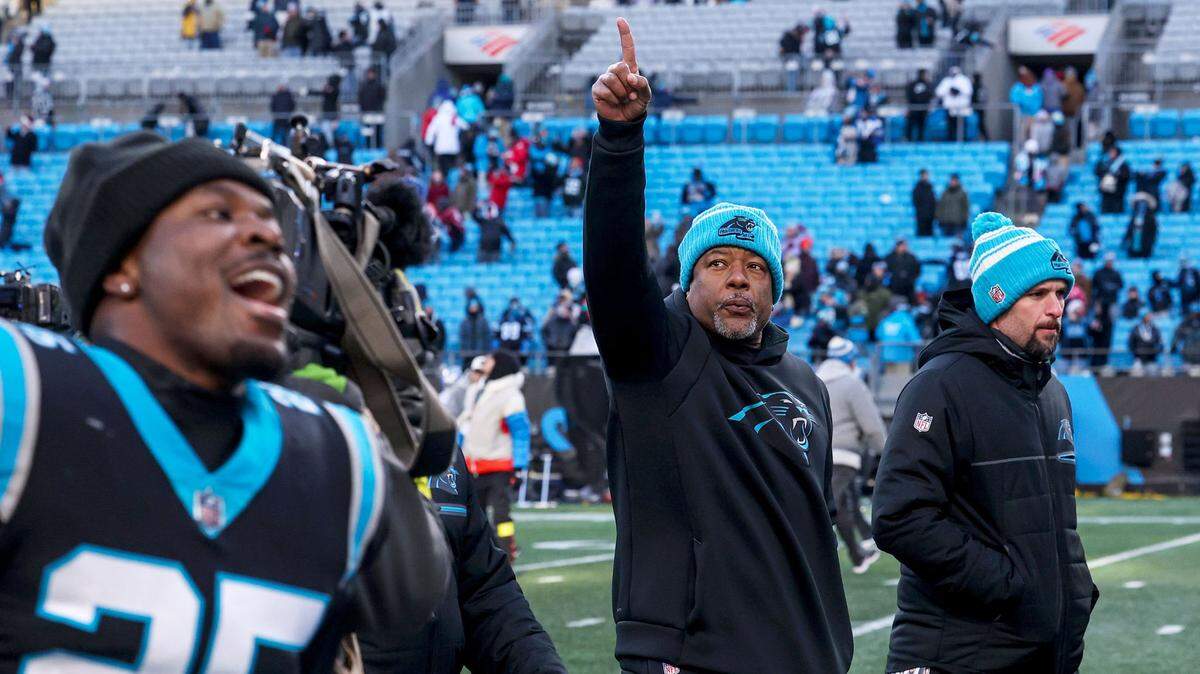 Panthers Head Coach Steve Wilks points toward the stands as he walks off the field after a win over the Lions, 37-23, on Saturday, December 24, 2022.