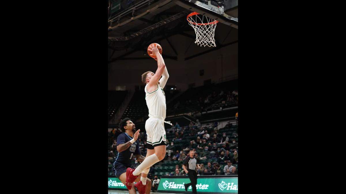Charlotte’s Austin Butler goes up for a dunk against Old Dominion at Halton Arena in Charlotte on Wednesday.
