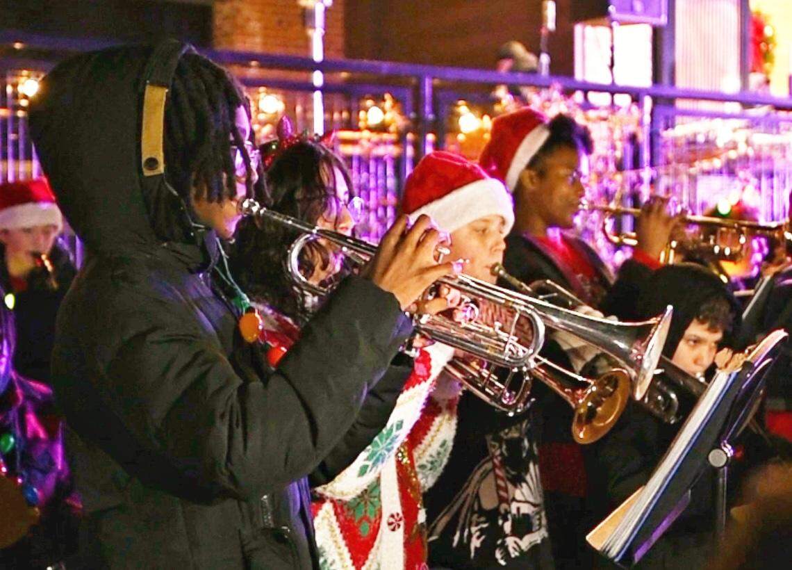 A band welcomes the holiday season in McAdenville.