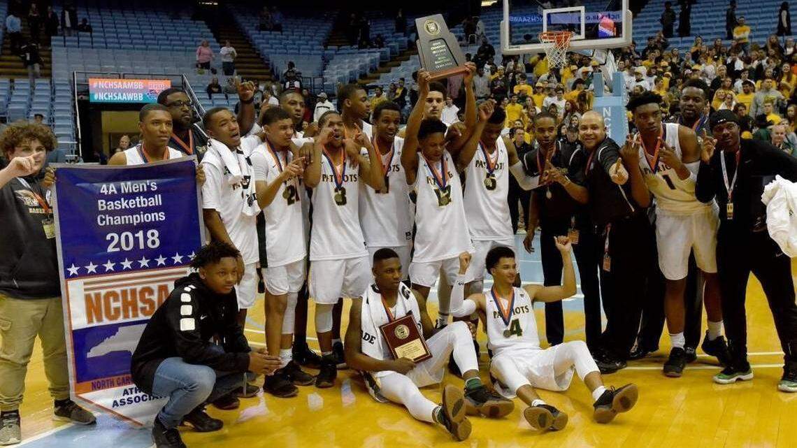 Independence High celebrates after winning the NCHSAA 4A state basketball championship in Chapel Hill. It was the Patriots first state title since 1997